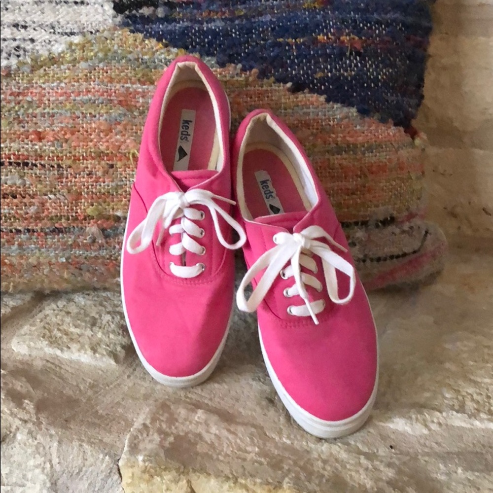 Pink Keds lace up sneakers